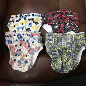 Four glowbug cloth diapers.